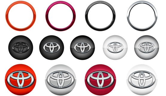 Different coloured AYGO centre caps in lines